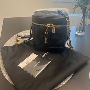 Saint Laurent vanity bag. Inspired by the 80s.